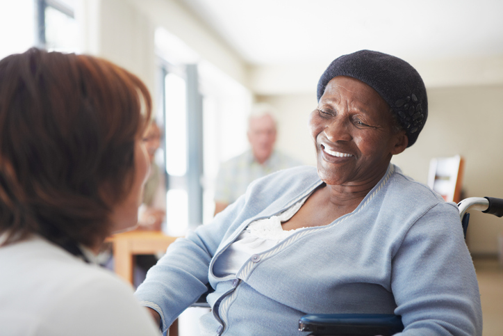Nurse talking with woman